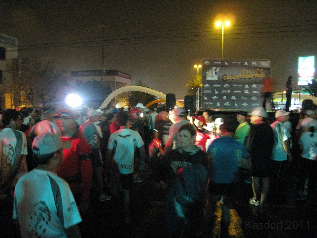 2011 Queretaro MX Half Marathon 170.JPG - The 2011 Queretaro Marathon on October 9. I was in town and was able to run the 21K, or 13.1 mile half marathon. Pretty dark yet at the start of the race! But people were out and ready to go!